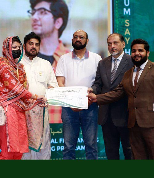Faria receiving her award at a PFTP ceremony